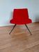 Vintage red faux fur armchair with black metal legs.