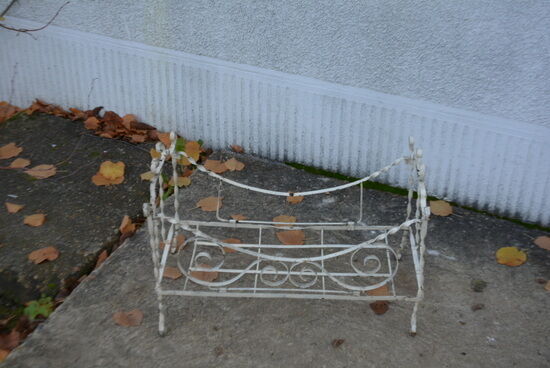 Wrought iron doll bed