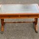 Victorian extendable coffee table in solid mahogany wood and green leather