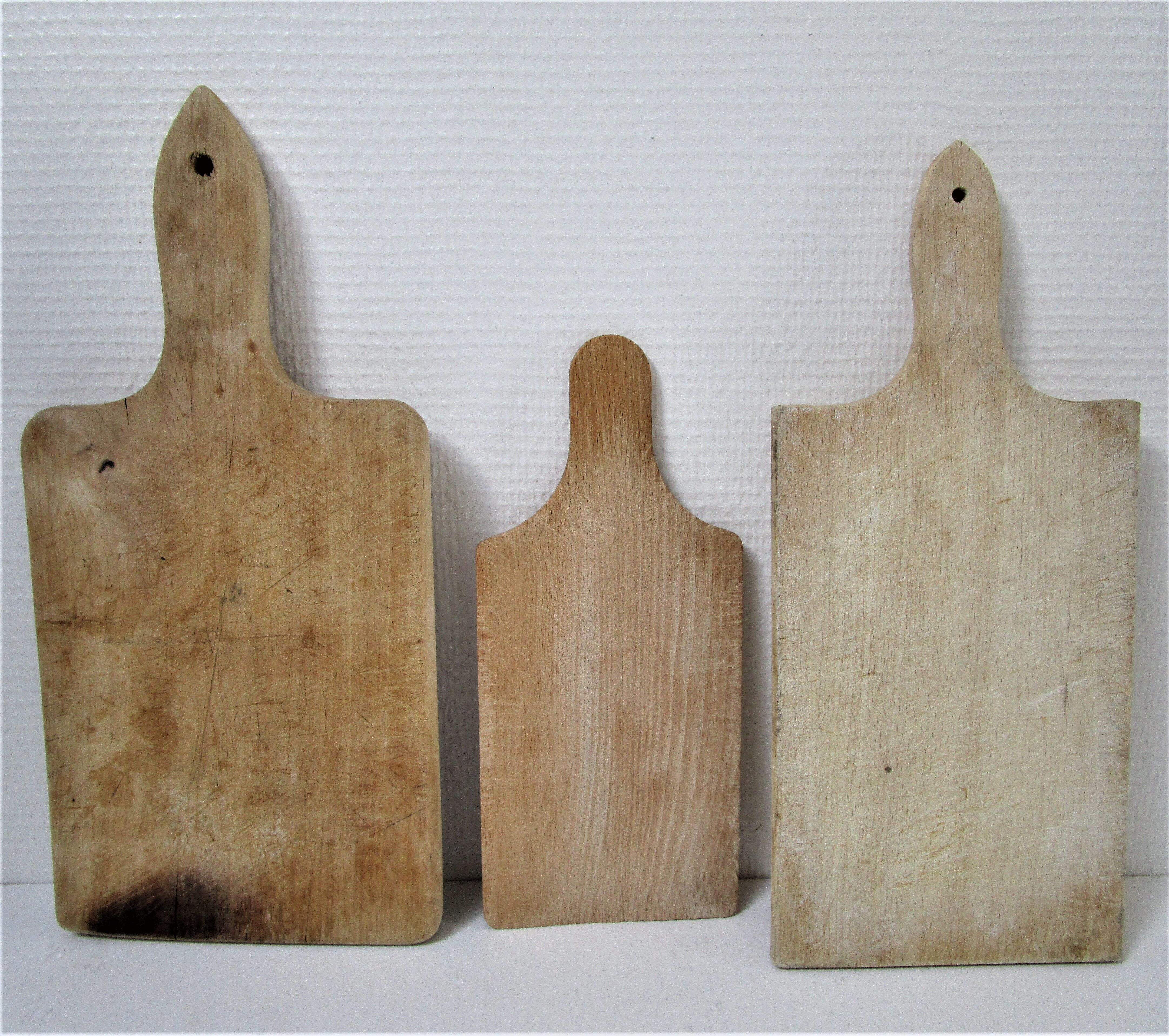 Three vintage solid wood cutting boards
