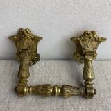 Articulated bronze handles