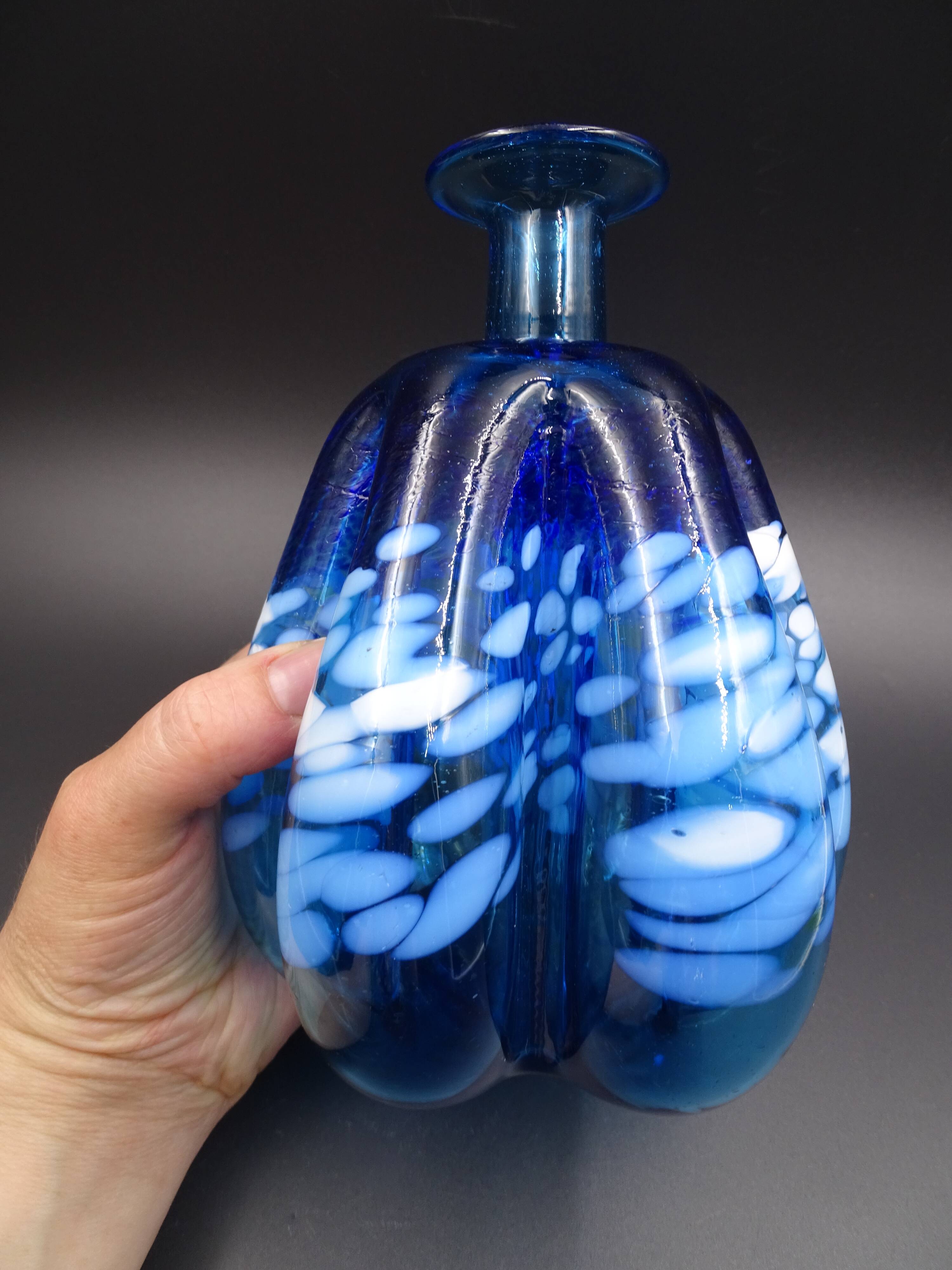 Blue glass vase and touches of white