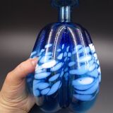 Blue glass vase and touches of white
