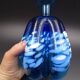 Blue glass vase and touches of white
