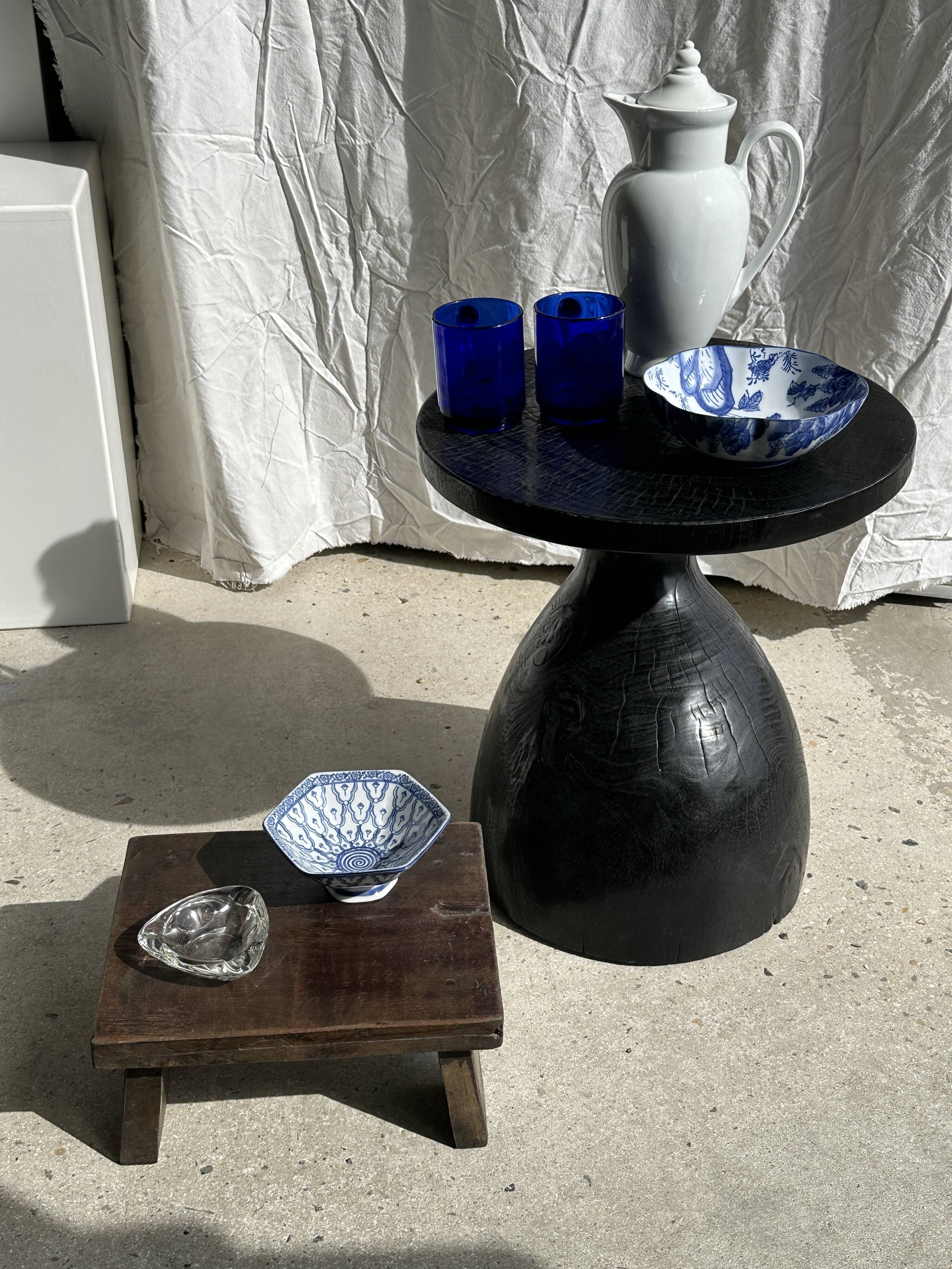 Solid wood (monoxyl) side table, organic shape, black color