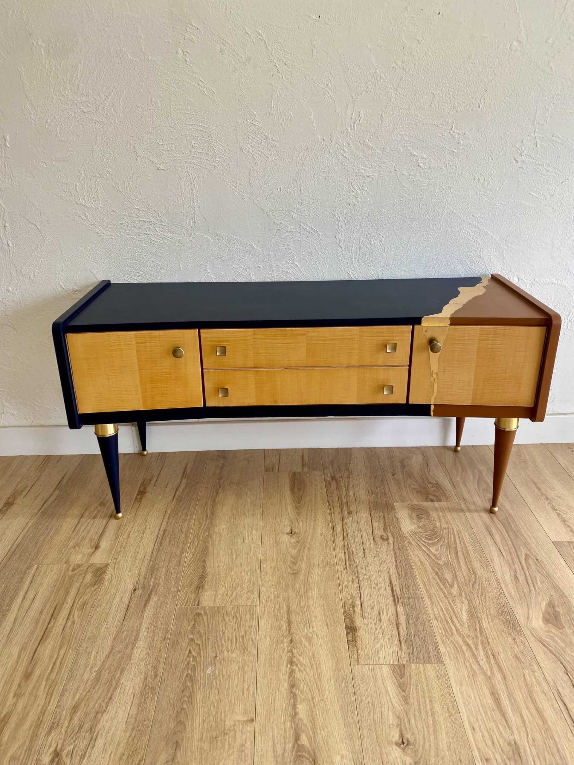 Vintage furniture revamped in navy blue, terracotta, and gold leaf – Reimagined mid-century style.