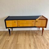 Vintage furniture revamped in navy blue, terracotta, and gold leaf – Reimagined mid-century style.