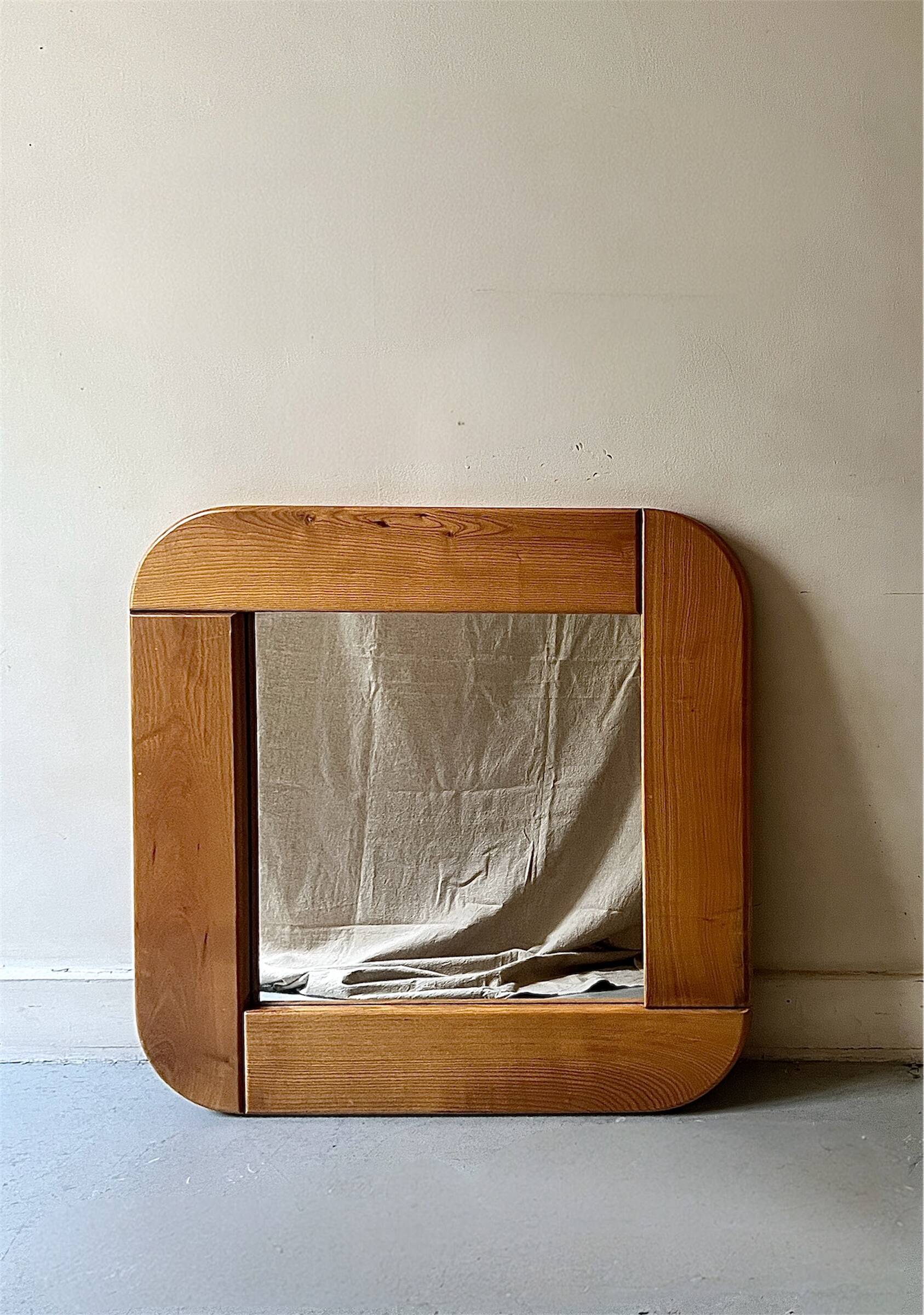Large oak mirror in the style of a revival house, 1970s design.