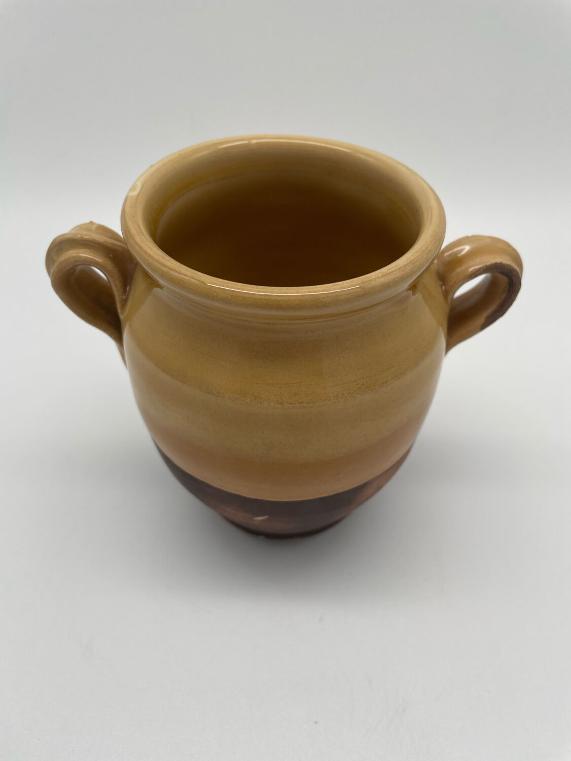 Varnished yellow terracotta confit pot