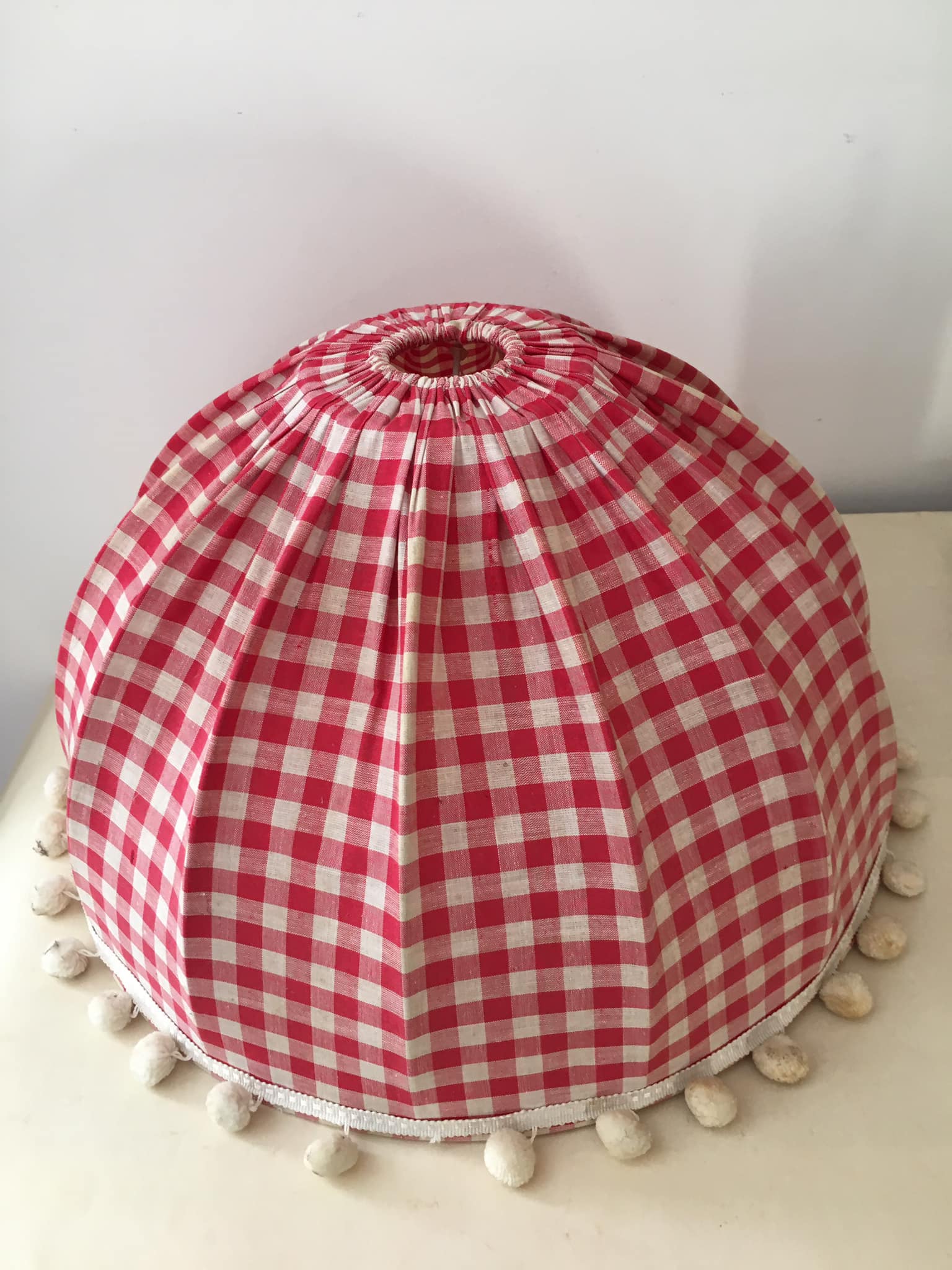 Lampshade in red gingham fabric and white pompoms