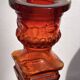 Pair of amber glass candlesticks
