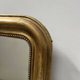 Louis Philippe mirror in wood and gilded stucco, 19th century