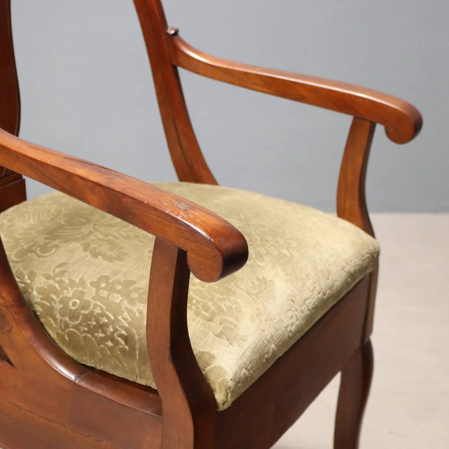 Antique Charles X armchair in walnut and fabric, Italy, mid-19th century.