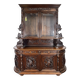 Buffet deux corps de chasse de style Henri II en chêne sculpté vitré