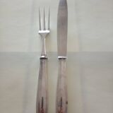 Serving cutlery in silver metal