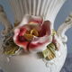 White dabbling vases with capodimonte porcelain floral decoration