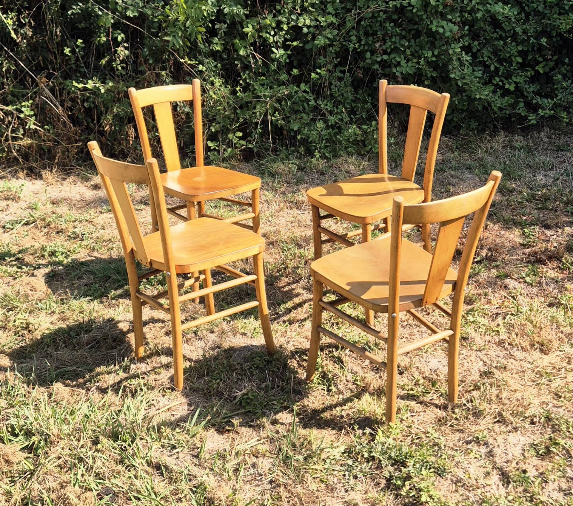 4 vintage bistro chairs from the 1950s in raw wood