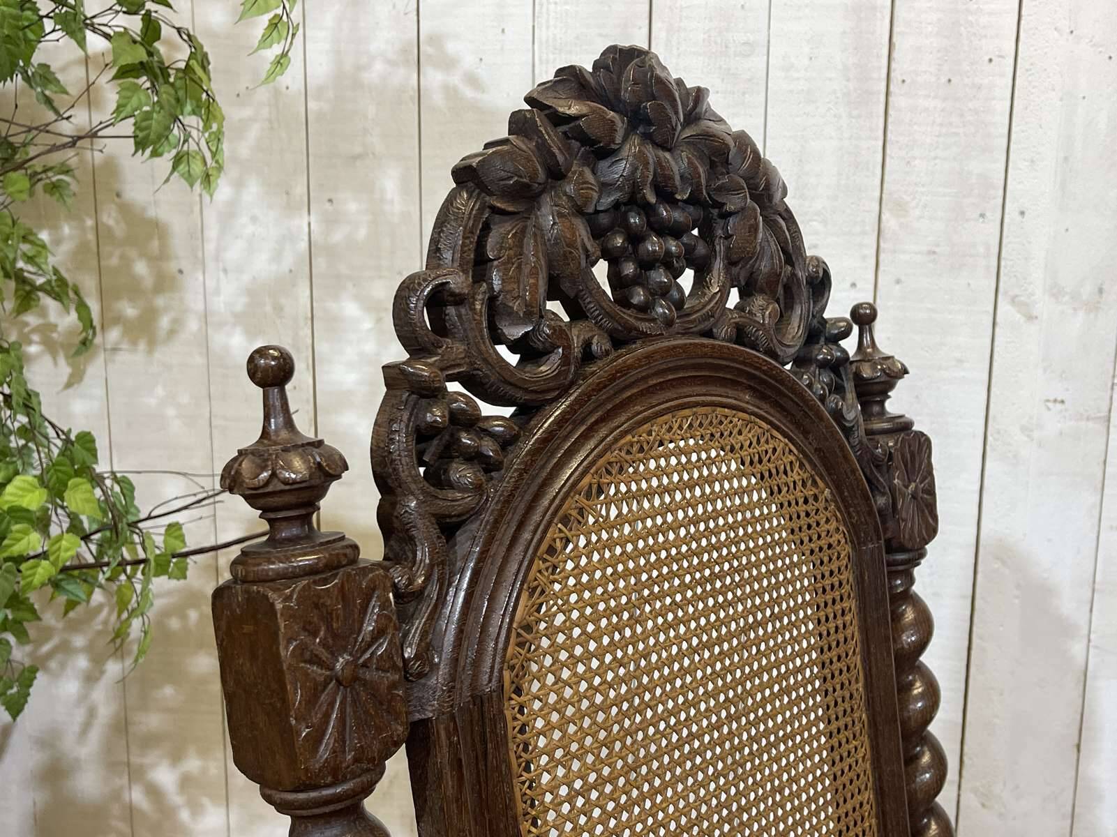 Louis XIII style armchair in oak - early 20th century