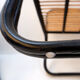 Paire de fauteuils design en bois courbé et osier