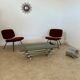 Table basse Space âge années 70 métal tubulaire et verre fumé design italien
