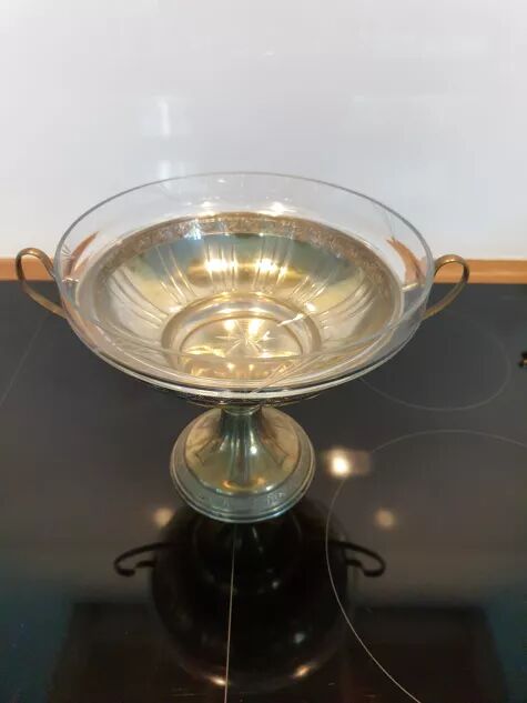 Art Deco brass cup and its engraved saucer.