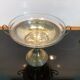 Art Deco brass cup and its engraved saucer.