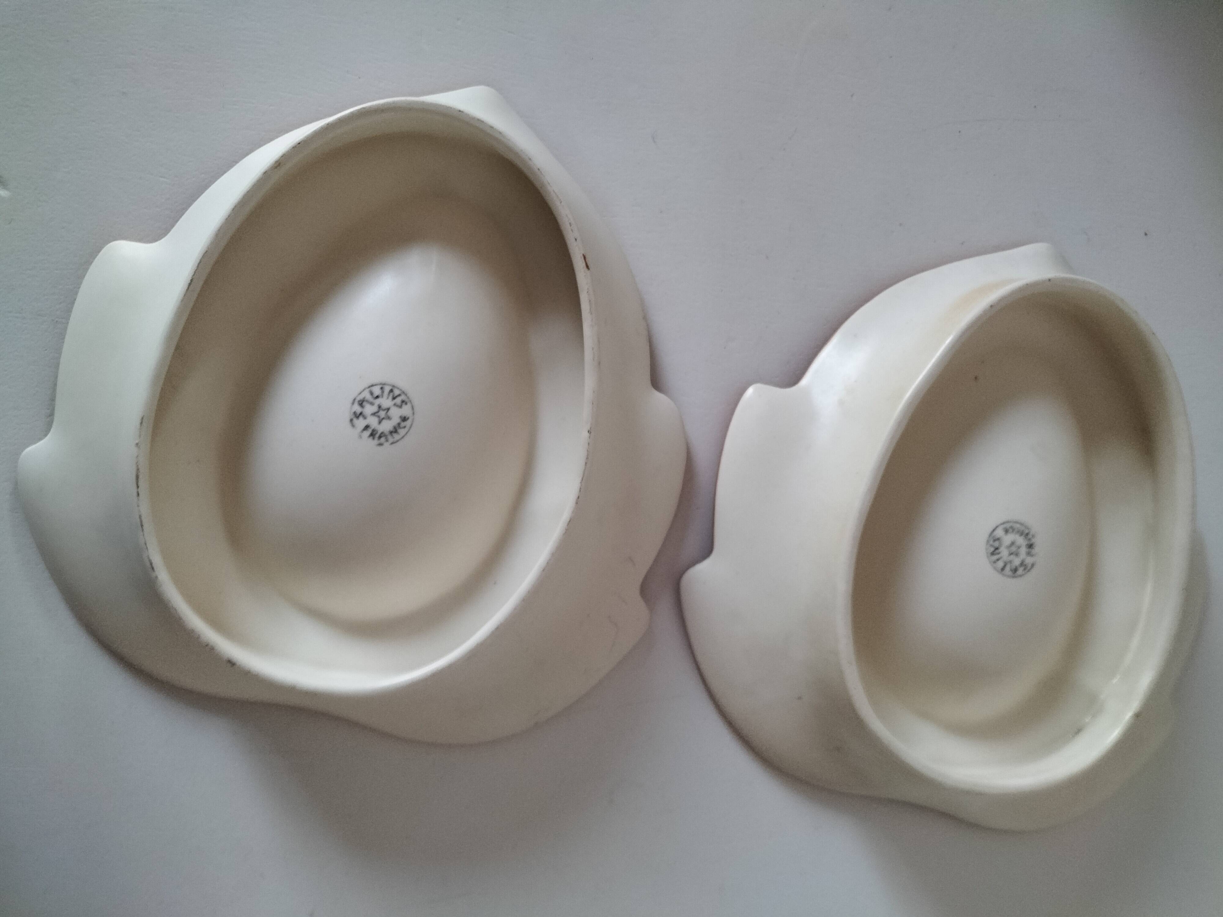 Two biomorphic bowls Salins France moss green 1950s