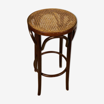 Curved wooden bar stool and cannage