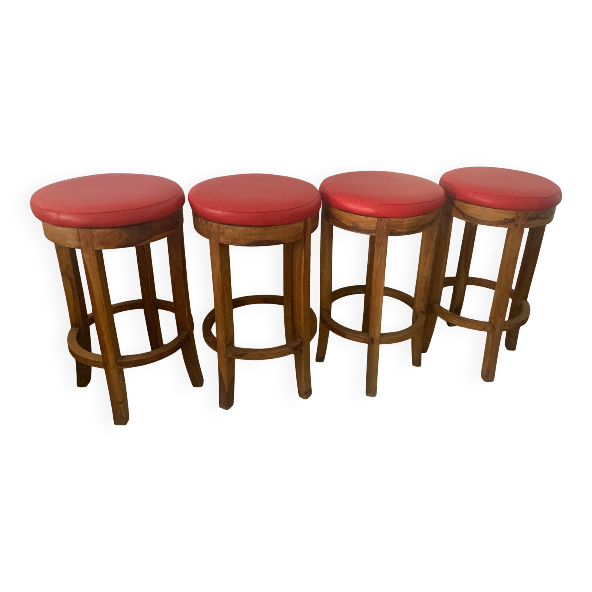 Set of 4 bar stools in solid exotic wood and red leather.