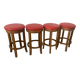 Set of 4 bar stools in solid exotic wood and red leather.