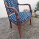 Empire style armchair reupholstered