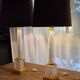 Pair of coloured table lamps, made of cut crystal and gilded bronze, in the Baccarat style.
