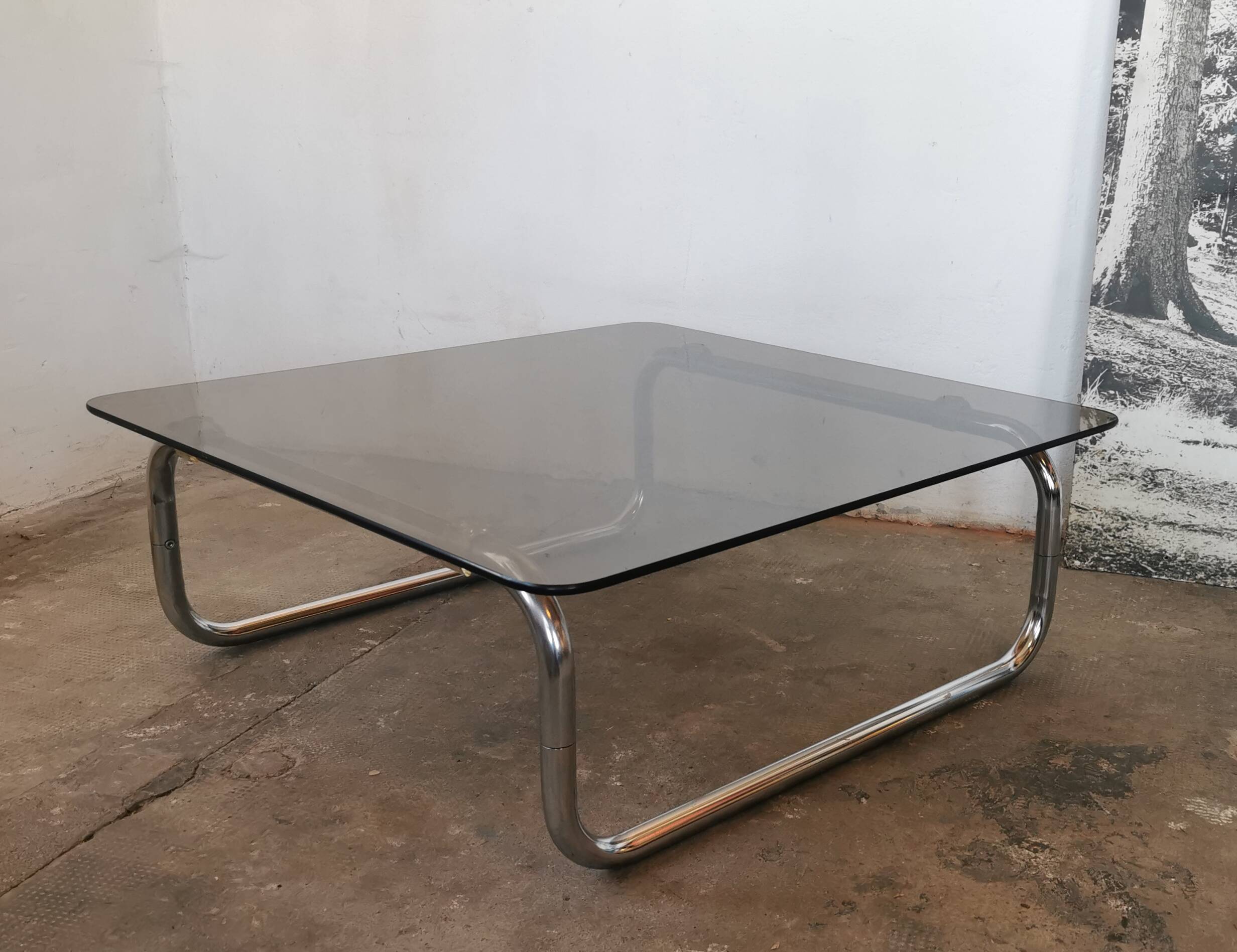 Chrome tubular metal and smoked glass coffee table