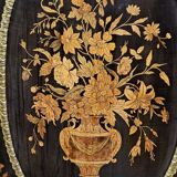 Boulle furniture with a curved shape from the Napoleonic III era in lacquered wood and marquetry.