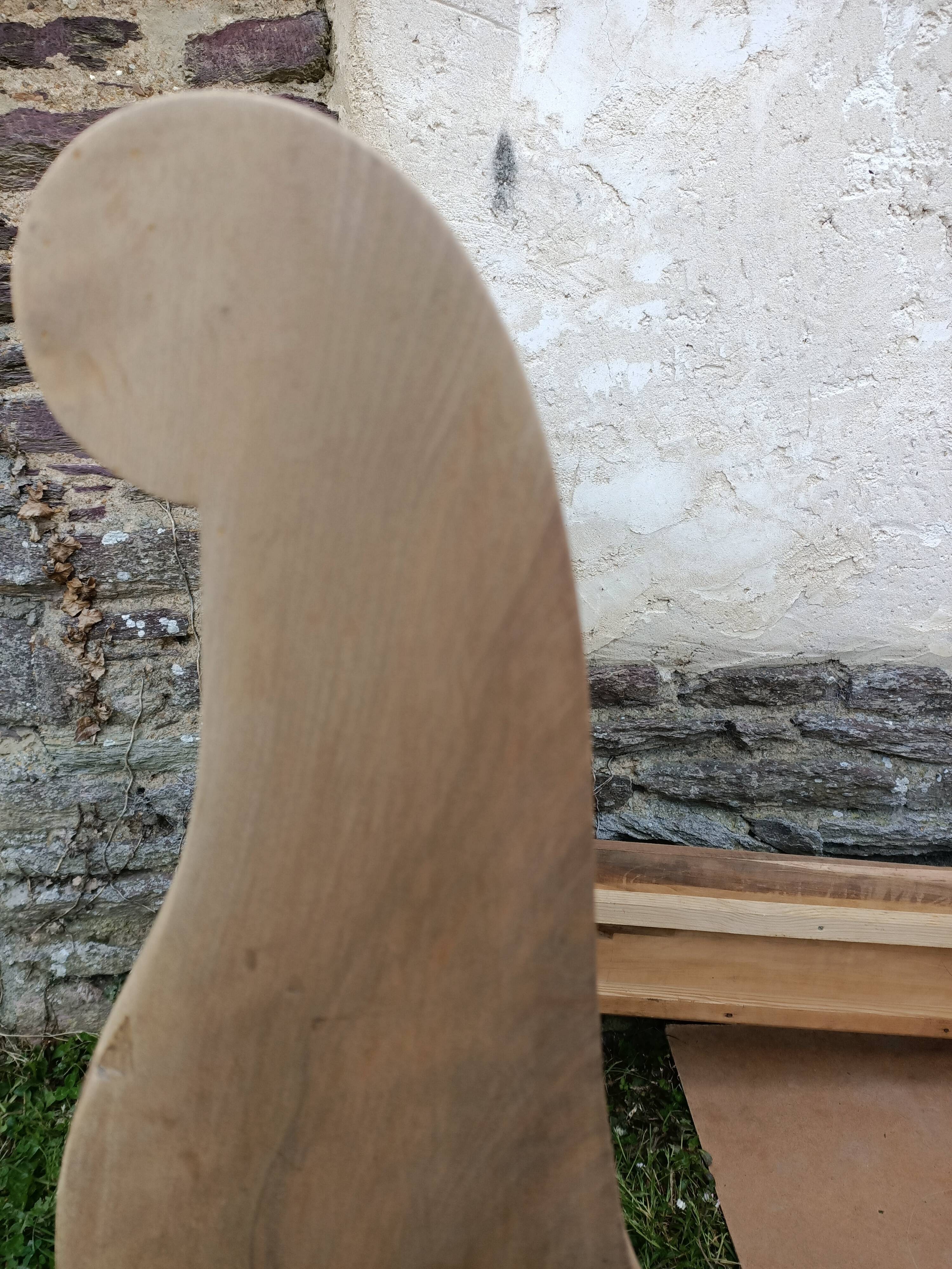 Old bed made of raw wood