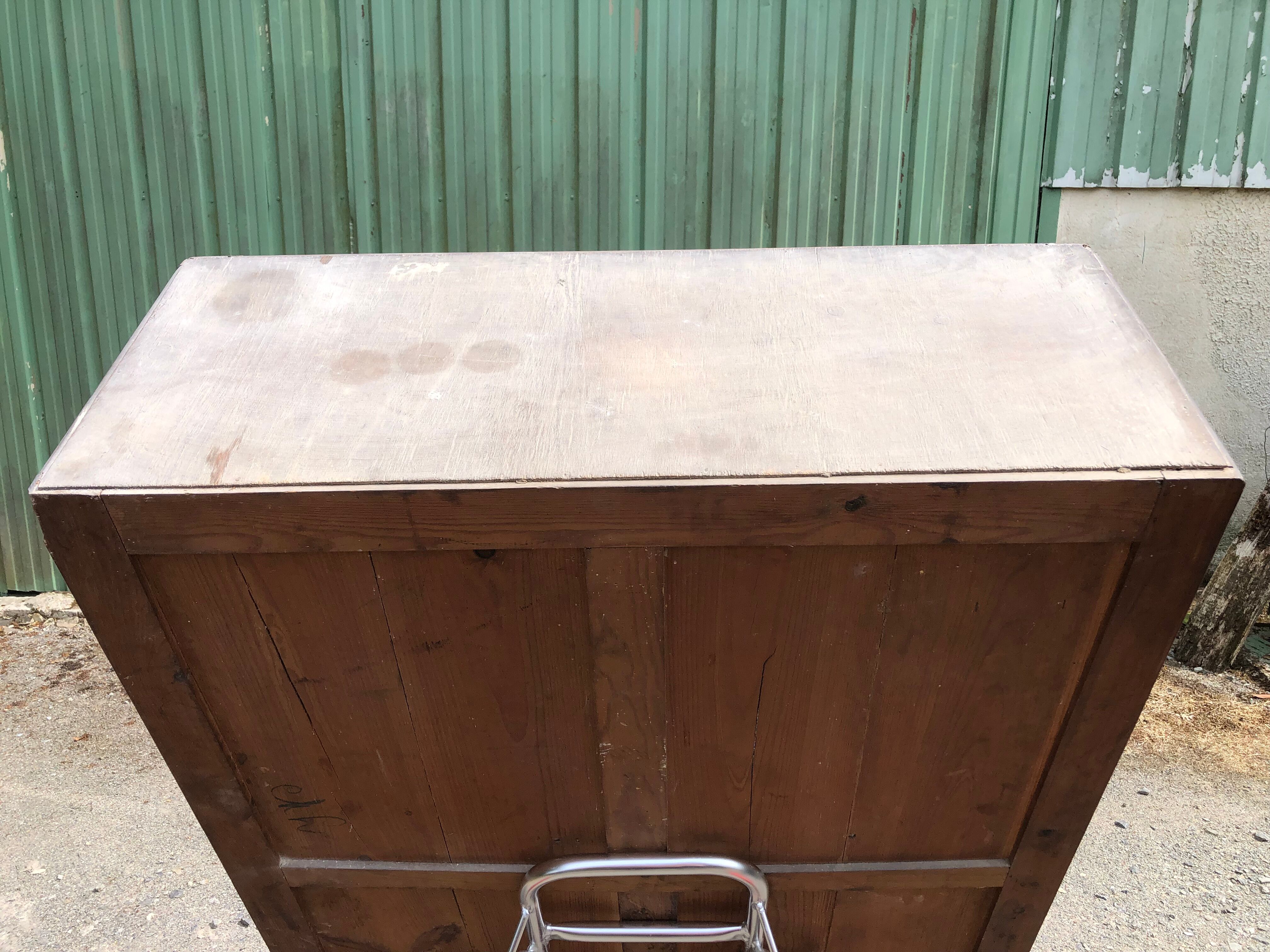 Vintage Parisian pine cabinet.