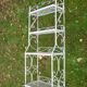 White wrought iron folding shelf