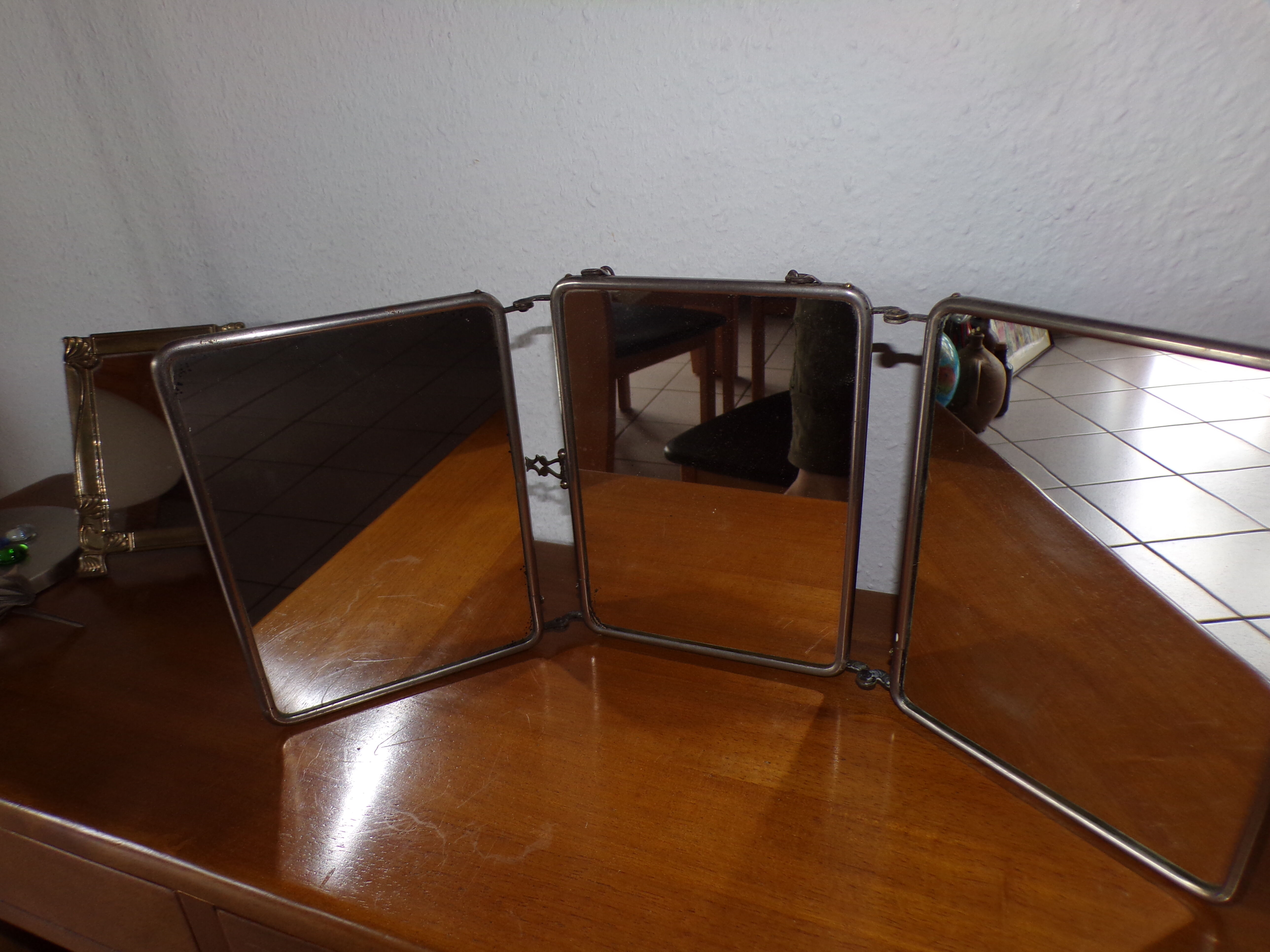 Old tryptic barber mirror