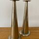 Pair of hammered metal candlesticks