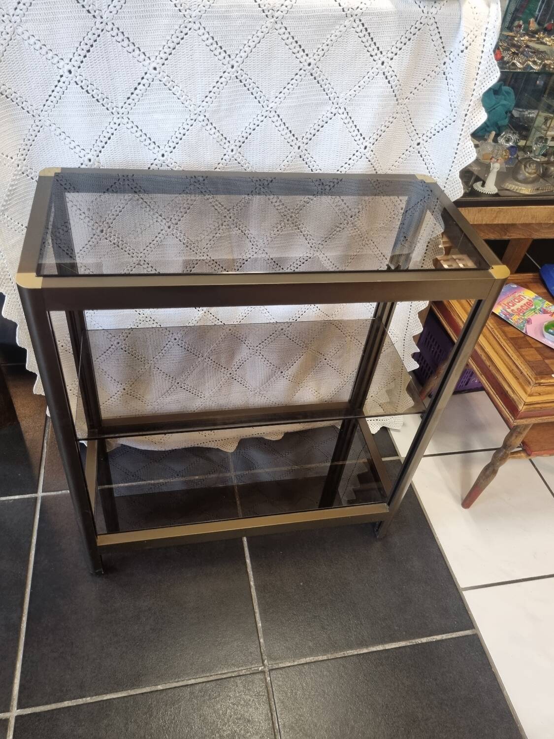 Vintage smoked glass console design