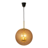 Large Limburg pendant light in brass with smoked glass ball, Germany, 1970s.