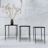 Suite of metal and glass nesting tables.