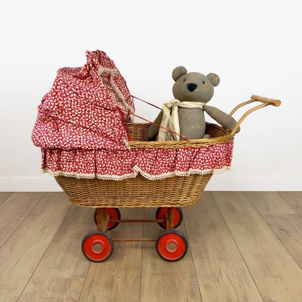 Vintage wicker doll pram cradle