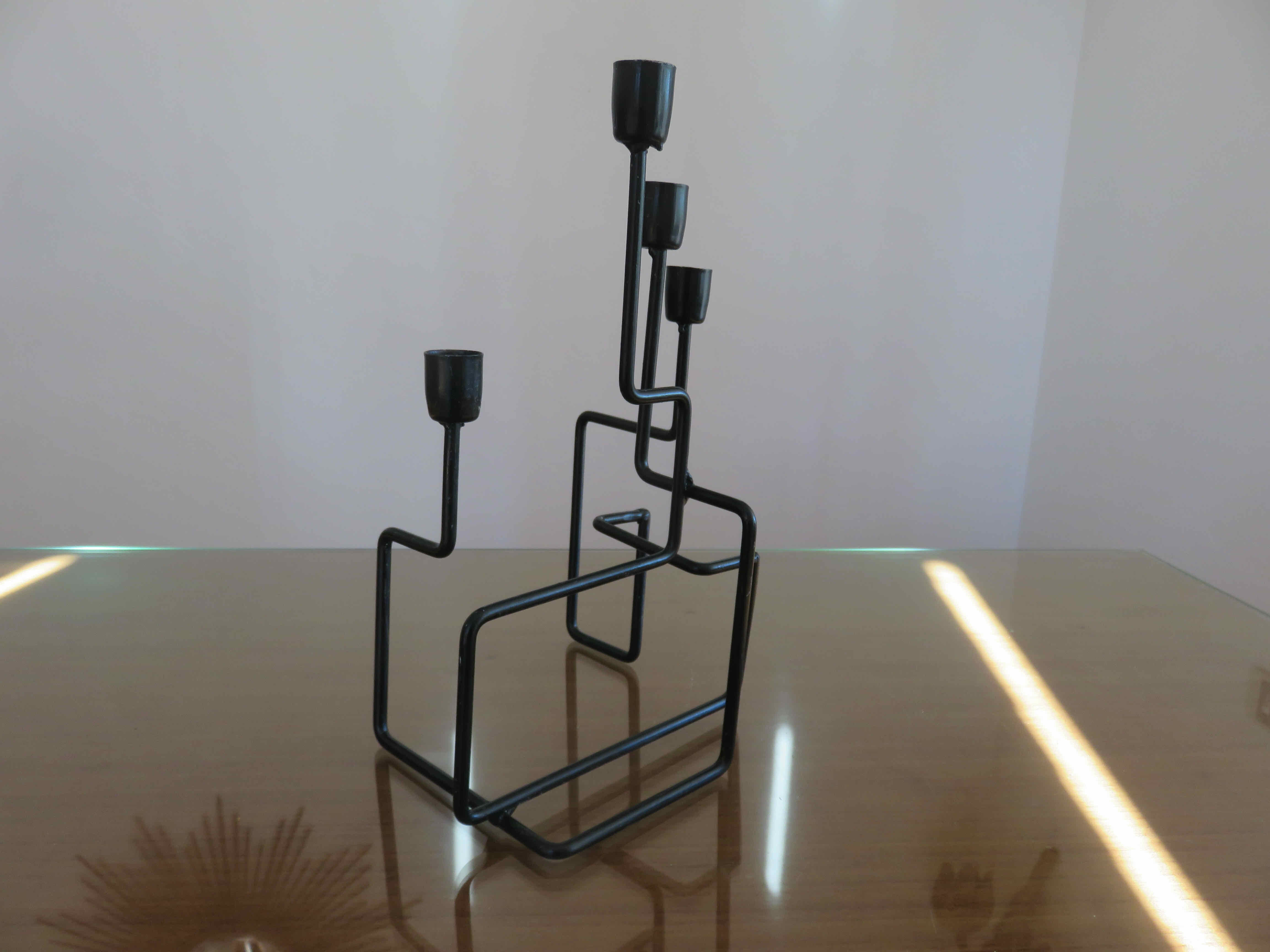 Modernist candle holder in black lacquered metal 1990
