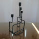 Modernist candle holder in black lacquered metal 1990