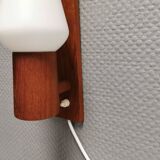 Wall lamp in teak with milky white cone-shaped shade in double glass