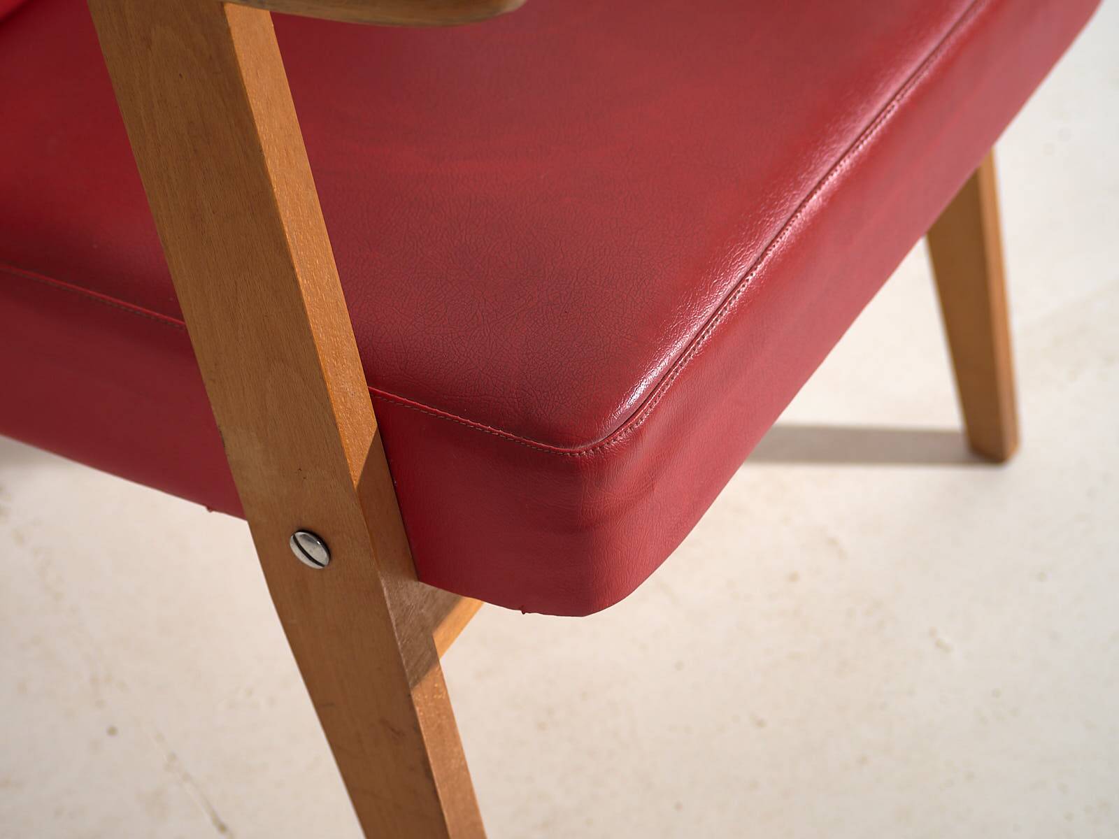 2 fauteuils rouges, vers 1960