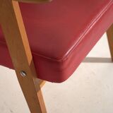 2 red armchairs, circa 1960