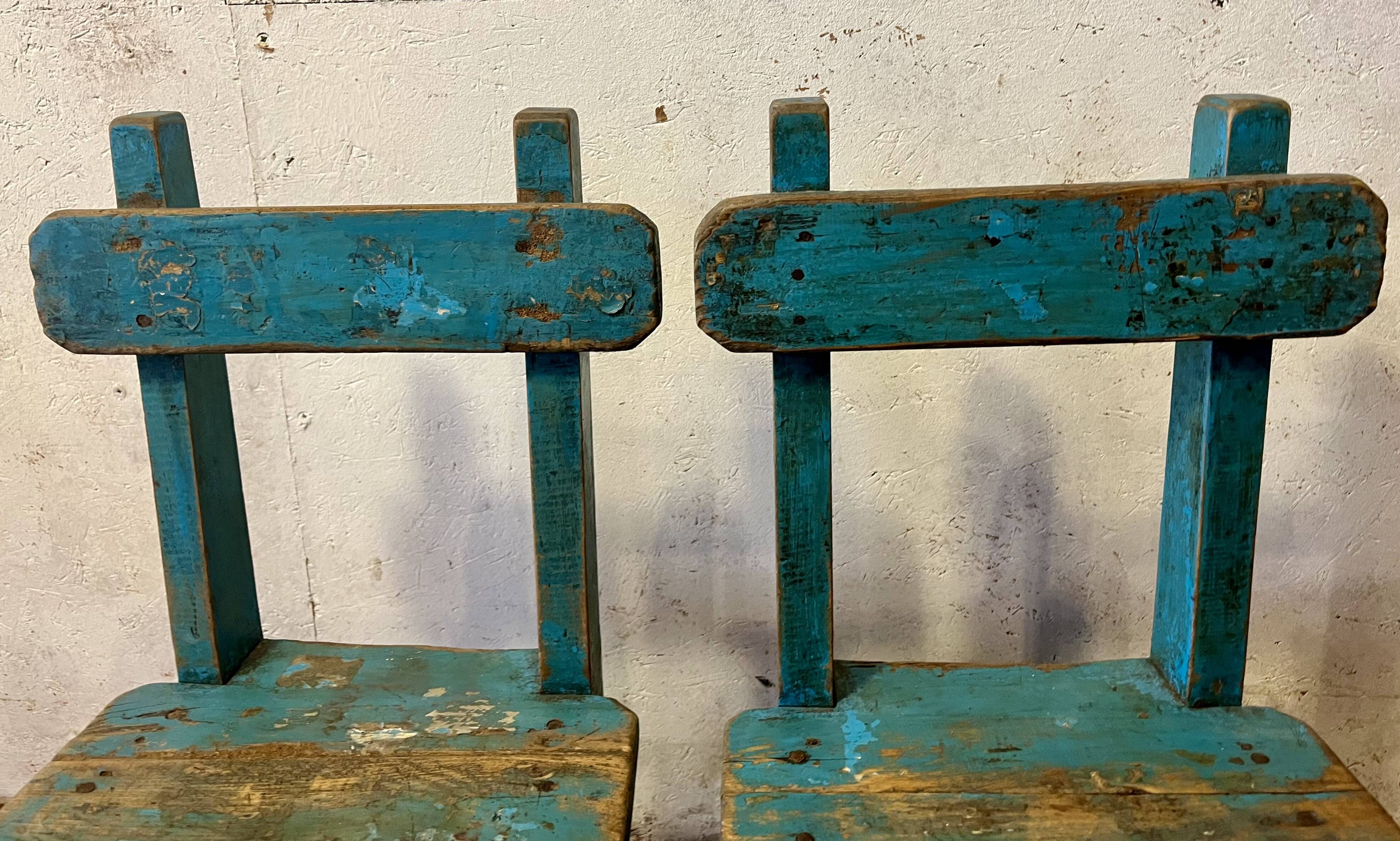 Old pair of small children's school chairs