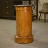 Empire gueridon in mottled maple with a blue stone top, 19th century.